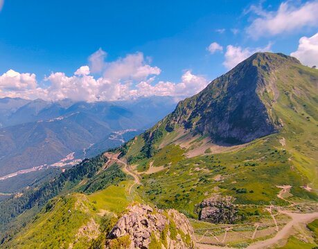Mountain landscape in Sochi, Krasnaya Polyana with clear sky and lush greenery