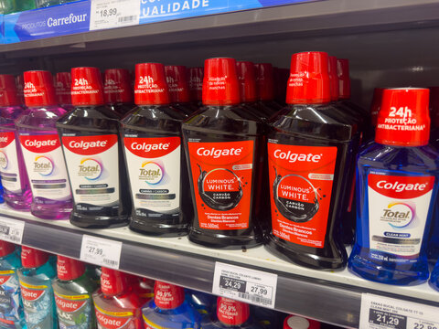 BELO HORIZONTE, MG, BRAZIL, MAY, 15, 2026 A close-up view of Colgate toothpaste bottles on a store shelf with price tags
