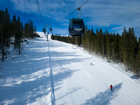Trysil, Norway - March 3, 2026: People skiing on ski pistes in the Trysil skiing area