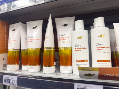 BELO HORIZONTE, MG, BRAZIL, MAY, 15, 2026 A shelf of Dove beauty products in a store with white and orange packaging