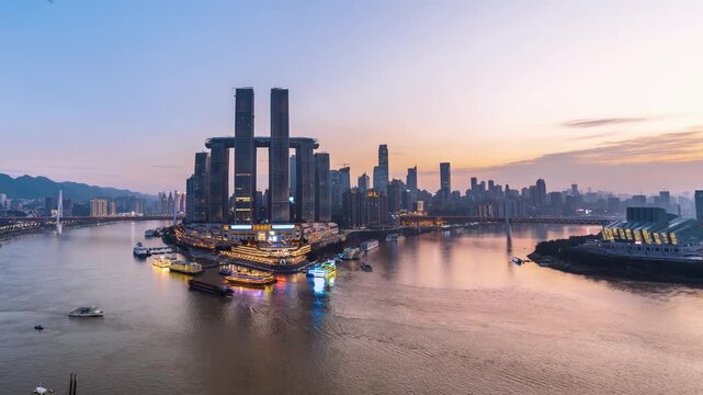 High angle day-to-night timelapse of Yangtze River and Chaotianmen Wharf in Chongqing, China  (panorama building complex with no intellectual property problem)