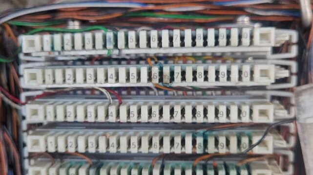 Old landline telephone cabinet with wiring
