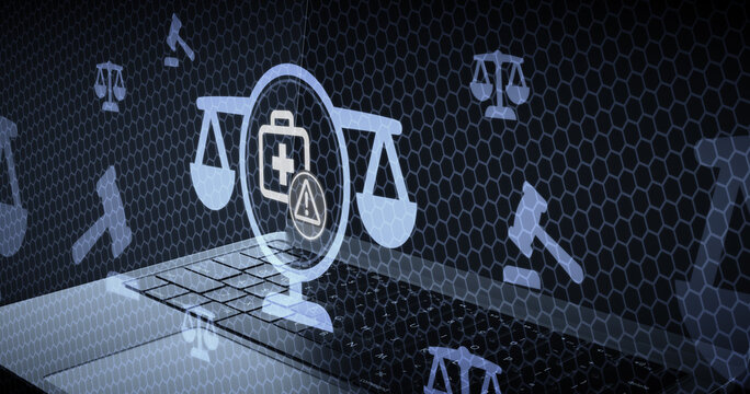 Conceptual image representing legal issues in healthcare with a medical kit icon scales of justice and a warning symbol overlaying a laptop keyboard in a digital environment