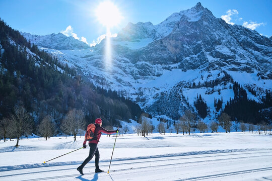 Cross country skiing in snowy mountains of Eng Valley Austria
