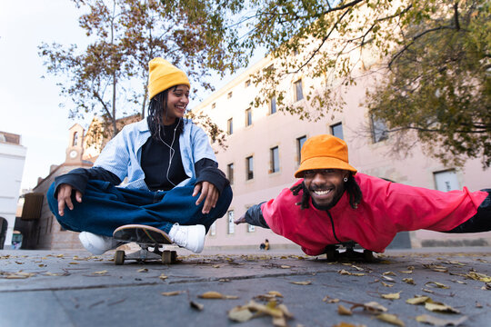 Skateboarders having fun on the street in Barcelona