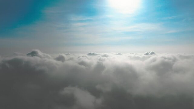 Sunlit Clouds Above the Sky