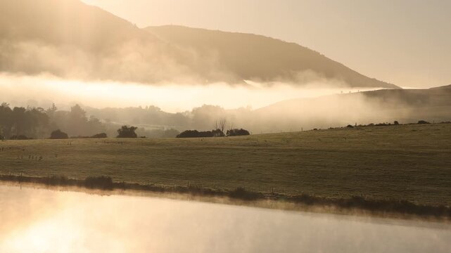 sunrise and fog over lake and farm land, Stanford, South
Africa