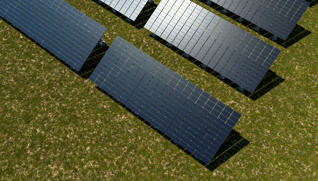 Aerial view of a solar farm in a green field for sustainable energy