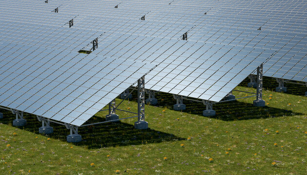Solar farm panels in a green grassy field on a sunny day