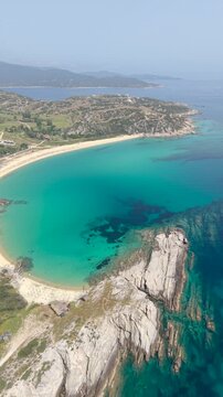 Marvel at the breathtaking views of Chalkidiki, Greece, featuring pristine beaches and crystal-clear turquoise waters. Halkidiki Kriaritsi Beach