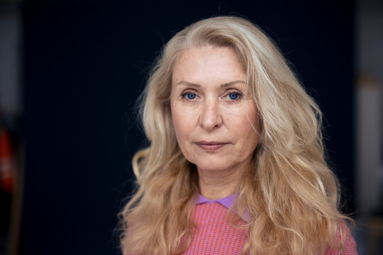 Blond senior woman at home