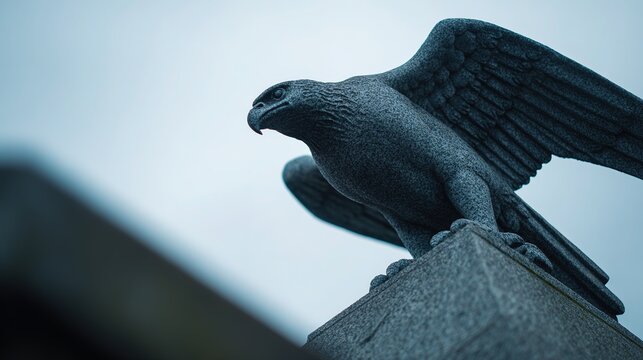 Stone eagle statue on prison gate pillar, guarding solemnly, dramatic low angle, granite texture, overcast sky, shallow depth