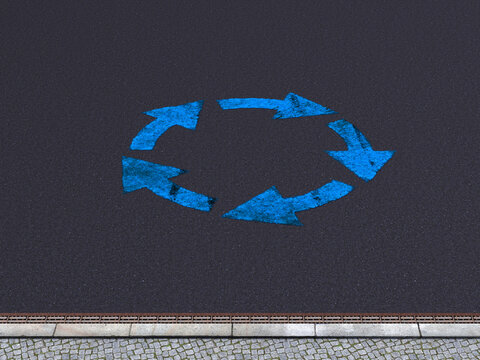 Blue circular arrows painted on an asphalt street with a sidewalk