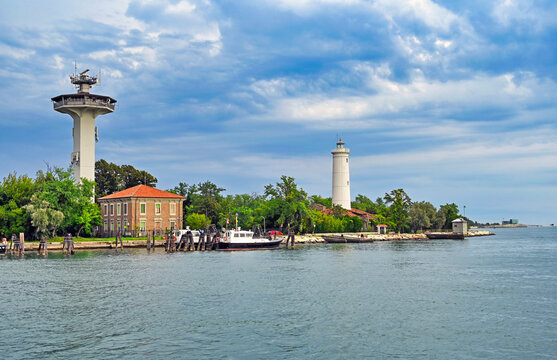 Torre dei Piloti and historic Faro Rocchetta lighthouse at Alberoni in Lido di Venezia