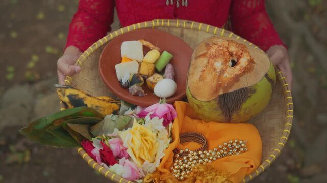 Close-Up Detail of Sesajen Offering on Bamboo Tray