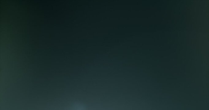 Slow motion cinematic lens flare and light leak effect isolated on black background. Perfect overlay for VFX, transitions, title reveals, film burn style and glow highlights.