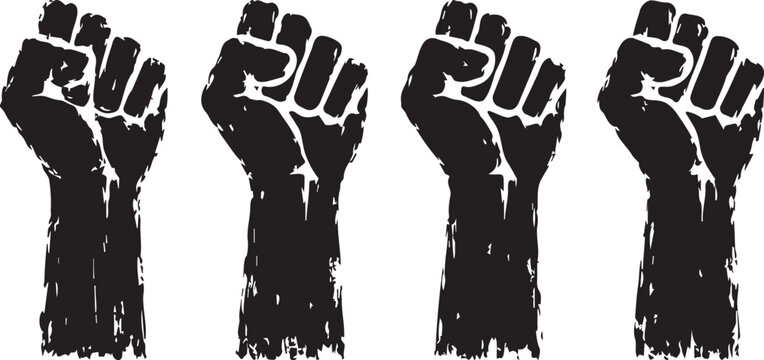Four black silhouettes of raised fists representing power and social justice shown in this high contrast graphic art style photograph