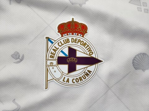 Photo of the embroidered emblem of Real Club Deportivo de La Coruna on the 2025&ndash;2026 third kit. Deportivo La Coruna is a Spanish professional football club based in the city of A Coruna.