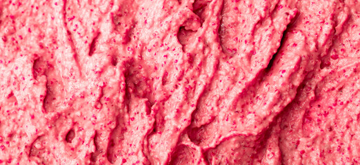 Obraz premium Fruit pink ice cream. Yogurt smoothie with fresh fruits and berries. Ice cream texture. Delicious sweet dessert close-up as background.
