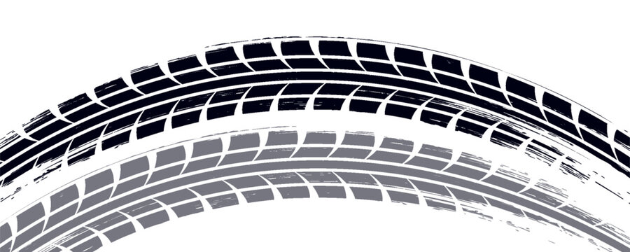 Black tire marks on road, Black rubber tire marks and tread marks, Tire trace track wheels texture and background, Auto tire tread grunge, Car wheel tyre tread track black tyre print, Top view.