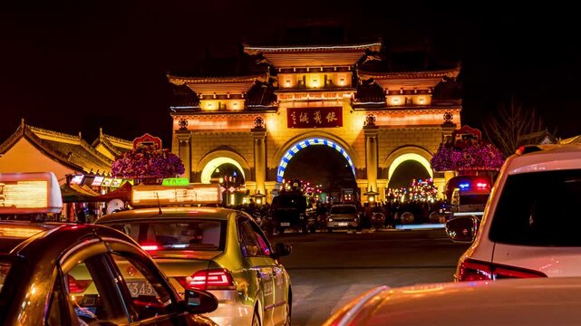 Illuminated Yongning Gate in Xi'an at Night with Traffic in Yongning Gate, Xi an, China