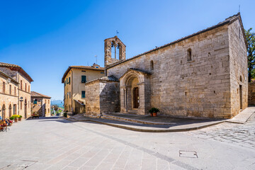 Obraz premium The old church of St Mary of the Assumption (Santa Maria Assunta) in San Quirico d'Orcia, Italy