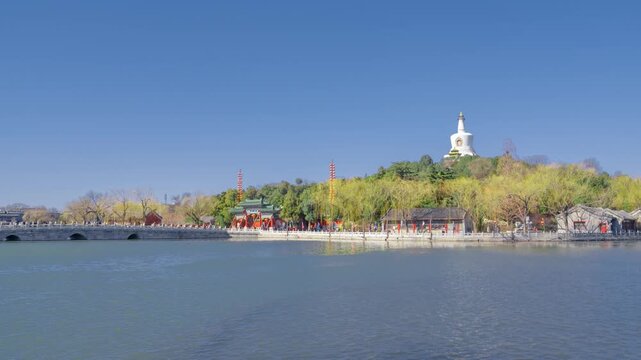 White Dagoba by the lake at Beihai Park in Beijing, China in Beihai Park, Beijing, China