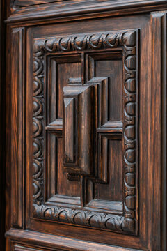 carved wood, rosette, acanthus leaf, architectural detail, wood carving, ornamental carving, decorative element, wooden texture, door detail, floral carving, classical ornament, wood texture, carved d