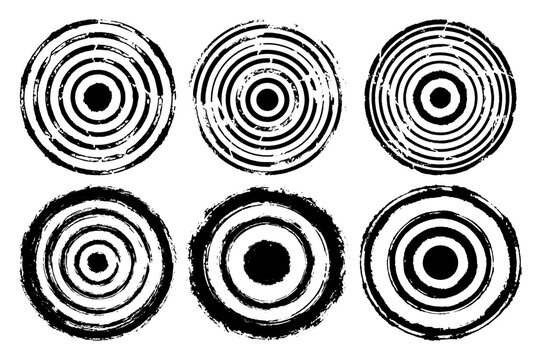 Concentric circles with distressed texture and ring patterns in grunge stamp style