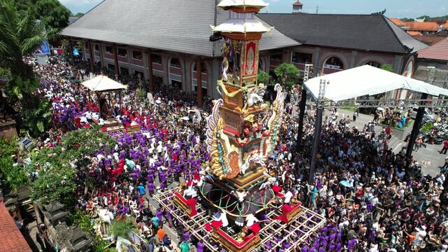 Aerial view of Ngaben cremation ceremony procession in Ubud, Bali, Indonesia