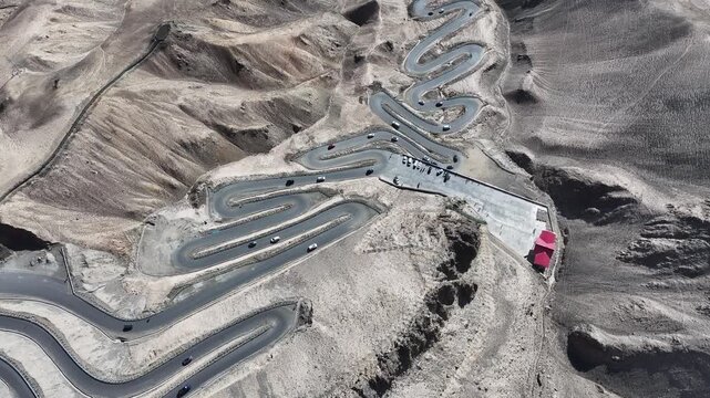 Winding Mountain Road Through Desert Hills