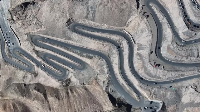 Winding Mountain Road Through Rocky Desert Landscape