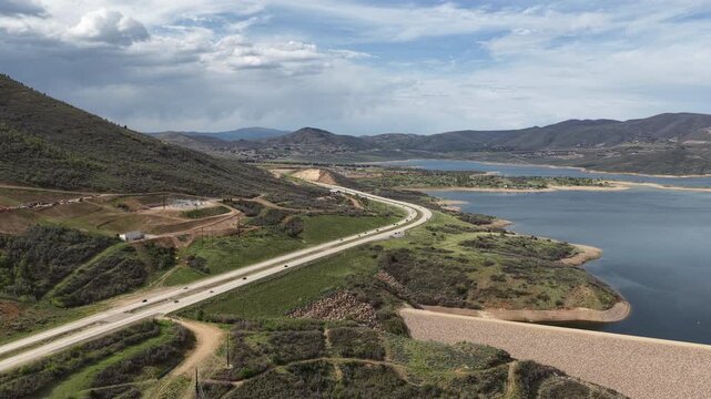 Aerial of Jordanelle Reservoir and highway in Heber Valley Utah in spring