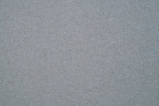 Gray recycled paper texture providing an eco friendly background surface