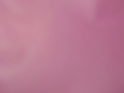 Una toma de cerca de un fondo abstracto de color violeta brillante con un degradado ligero desenfocado