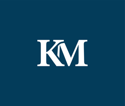 White KM logo on blue background  simple elegant design