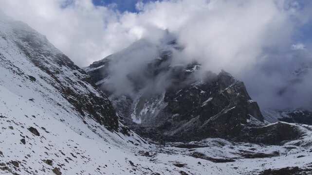 Lobuche East peak shrouded in the clouds in Himalayas, Nepal