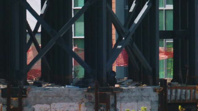 Close up view of steel beams and structural supports on an active construction site
