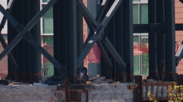 Close up view of steel beams and structural supports on an active construction site