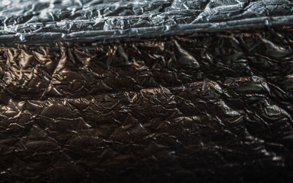 background of a texture and shape of a silver reflector