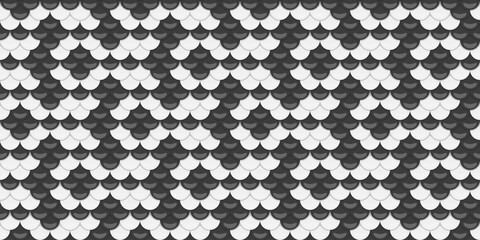 Abstract seamless pattern of black and white scales.  Elegant, geometric design perfect for backgrounds, textures, or fashion prints.  Evokes concepts of protection, strength, and style. © Olena