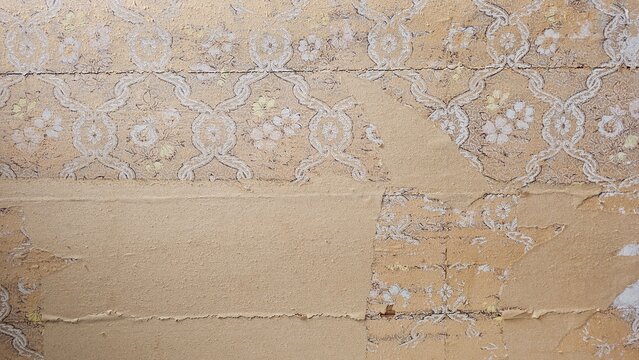 Horizontal grunge paper background with torn retro wallpaper layers