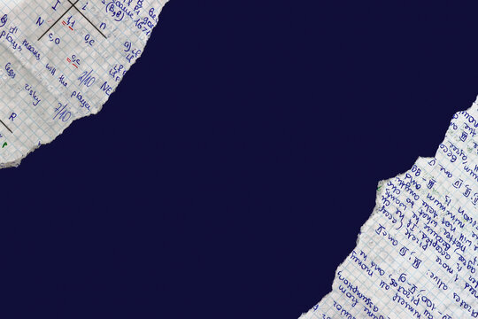 Torn graph paper with handwritten math notes frames, empty copy space on dark blue background. Back to school. Concept of math study, education, exam preparation, paper mockup