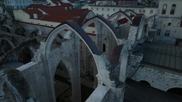 Cinematic Aerial View of Ancient Gothic Church in Lisbon Portugal at Golden Hour