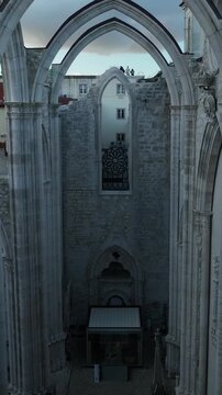 Cinematic Aerial View of Ancient Gothic Church in Lisbon Portugal at Golden Hour
