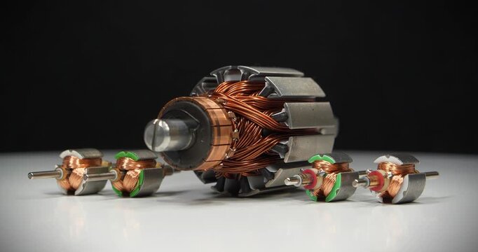 Large and small armatures or rotors of electric motors with copper coils from various household appliances and toys