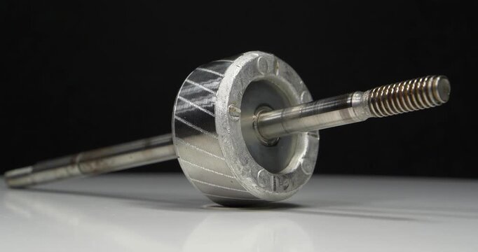 Metal armature or rotor of electric motor with long axis