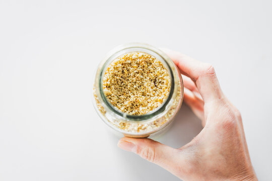 chilli flakes in glass pantry jar; top down close up