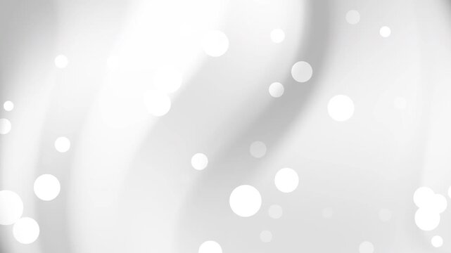 Abstract white and grey gradient background with soft floating circular bokeh. Suitable for website banners, social media graphics, and digital designs.