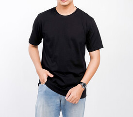 Obraz premium Male body wearing black t-shirt and blue jeans seen from behind and isolated on white background